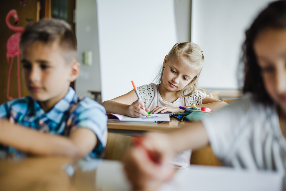 children-sitting-classroom-studying.jpg